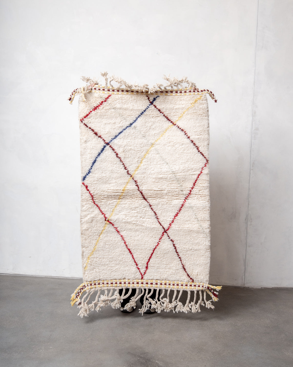 Modern, designer, handcrafted Berber rug from Morocco. Beniourain carpet with beautiful colours and patterns and fluffy wool texture.